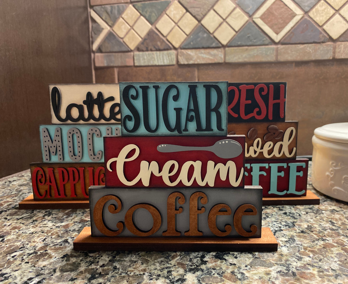 DIY coffee-inspired wooden sign kit with unpainted pieces, glue, brushes & stencils.