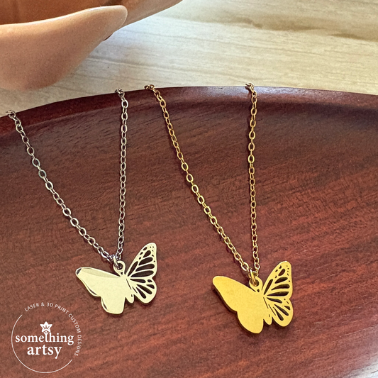 Filigree Butterfly Necklace in gold and silver stainless steel