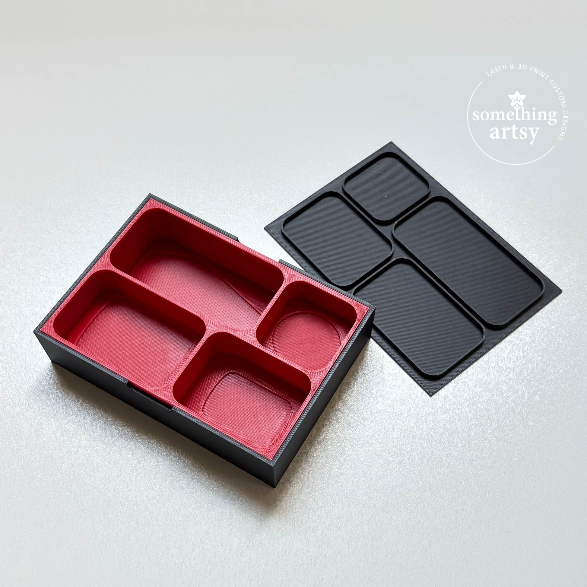 Bento box-style case with lid and internal dividers
– Designed to hold and display each piece of the 3d printed sushi magnets