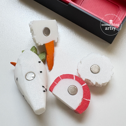 White Uramaki set of 3d printed magnets, showing the back with the magnet