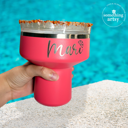 Margarita tumbler in Daiquiri color, with a name engraved in front of a pool