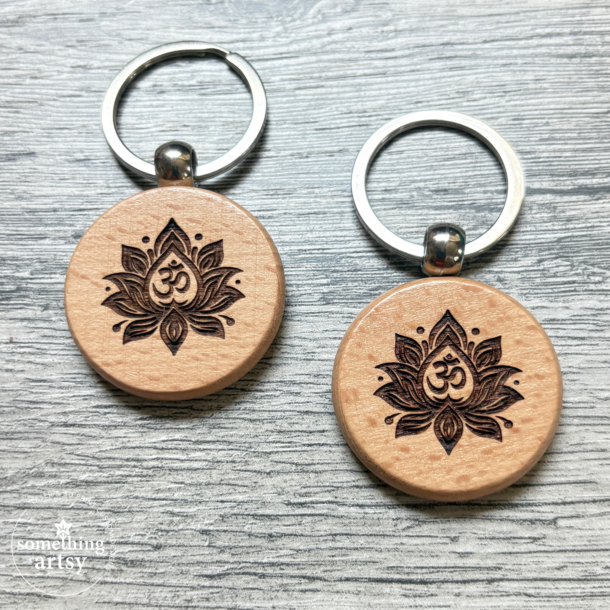 Two round natural wood keychain with Namaste symbols and stainless steel ring