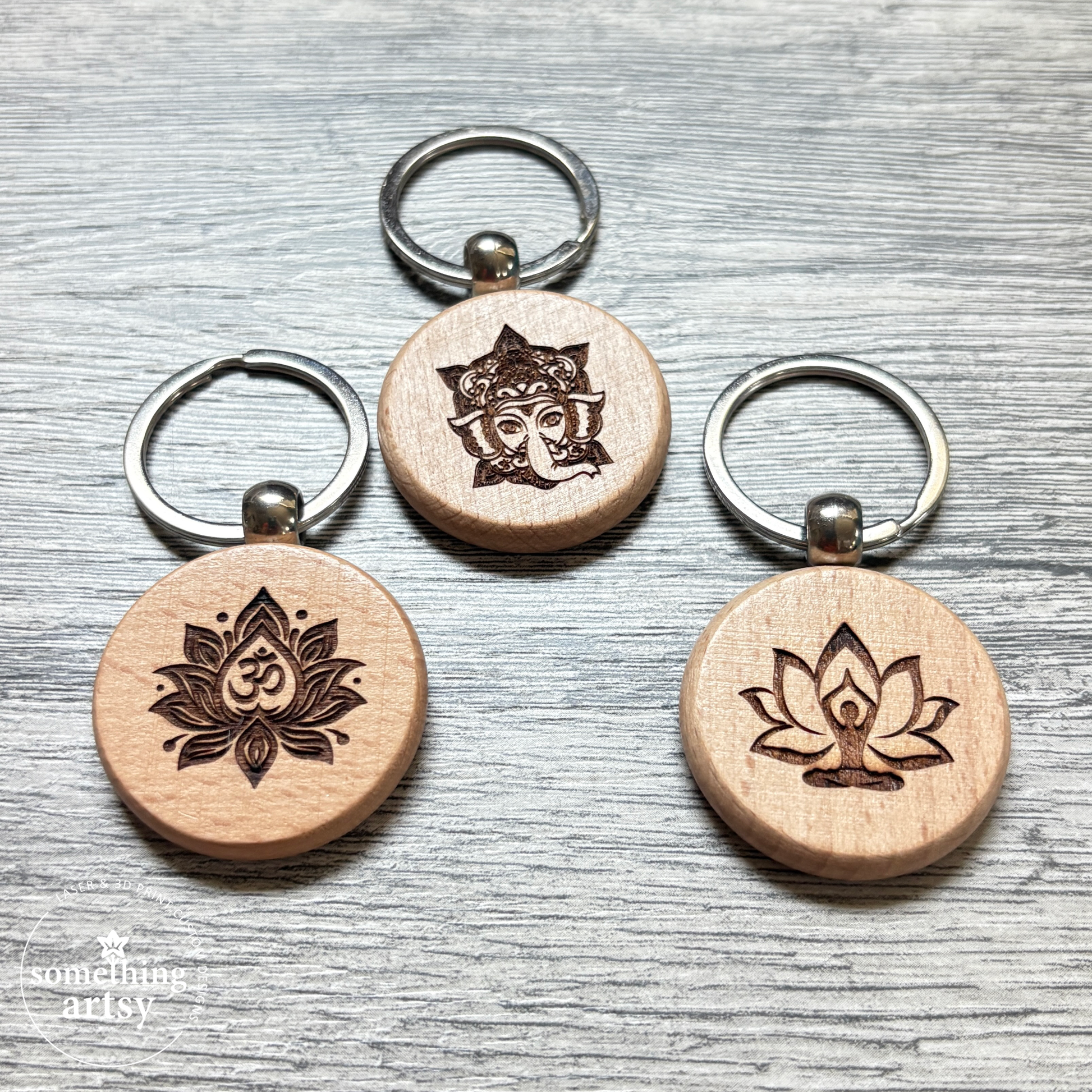 Three round natural wood keychain with Namaste symbols and stainless steel ring