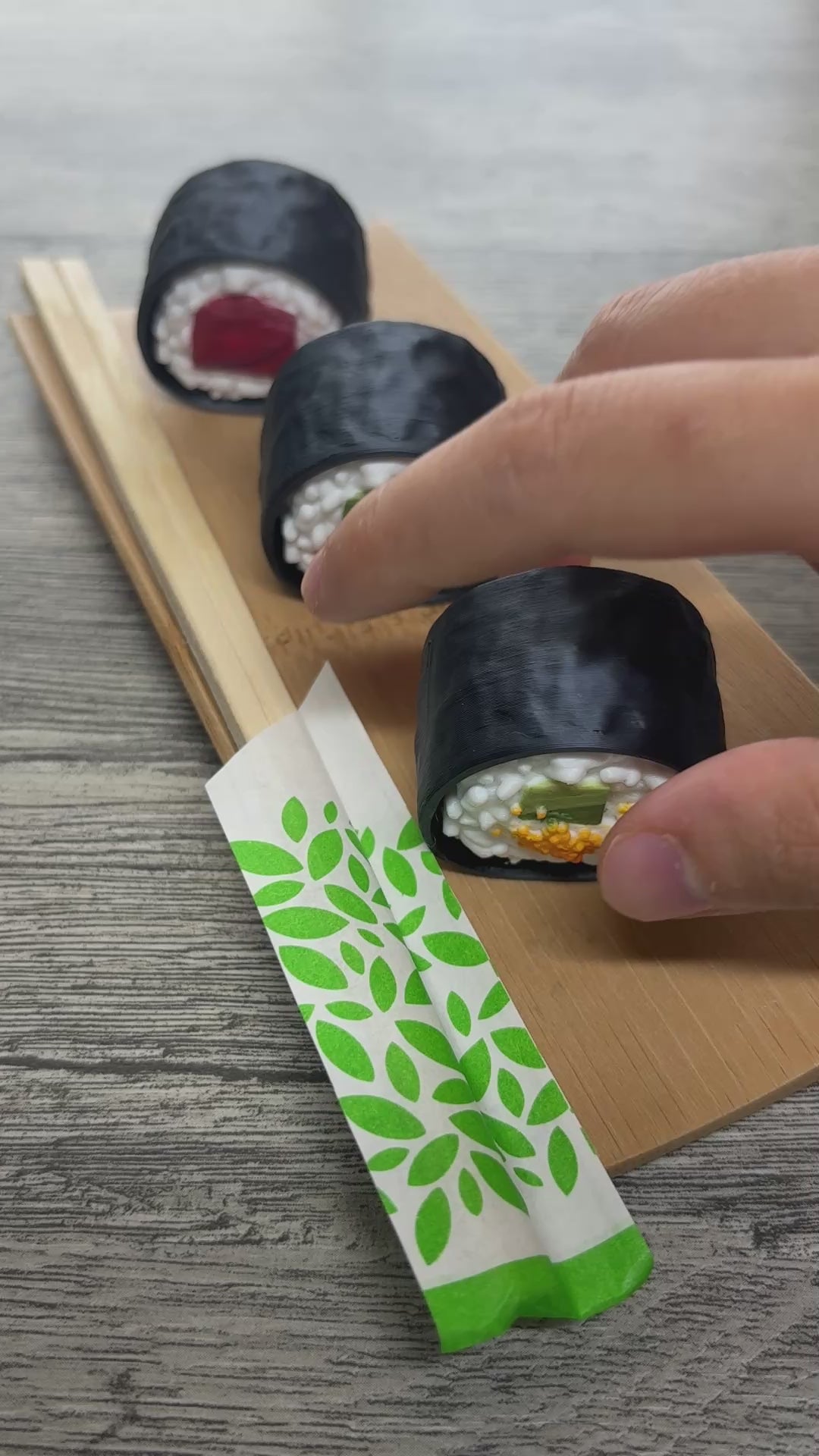 Video of sushi clicker set with someone clicking one.