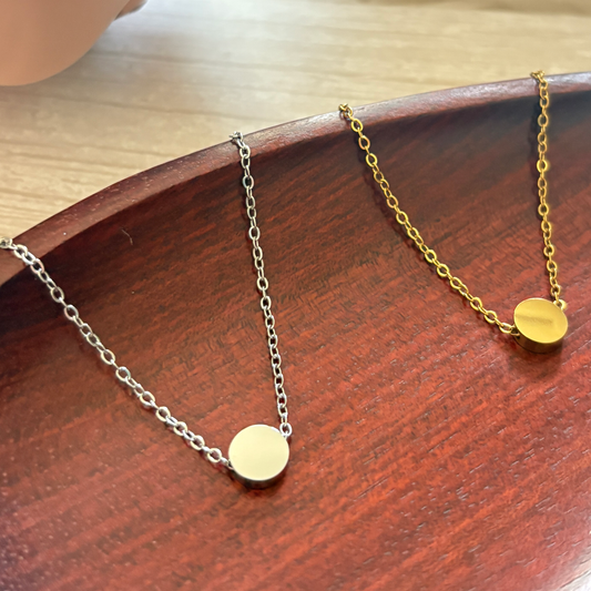 Tiny circle charm  in silver and gold finish
