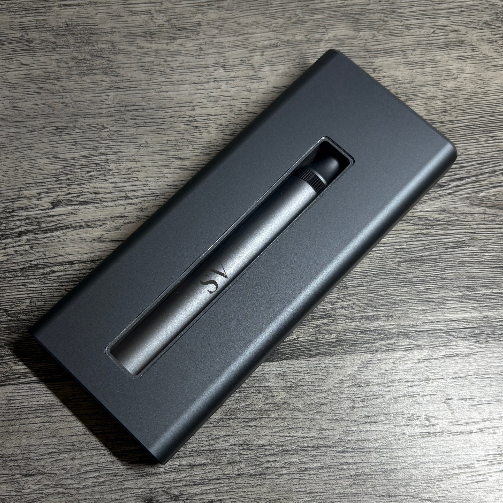 Front view of 52-in-1 Electric Screwdriver Set with the custom initials SV engraved on the screwdriver tool